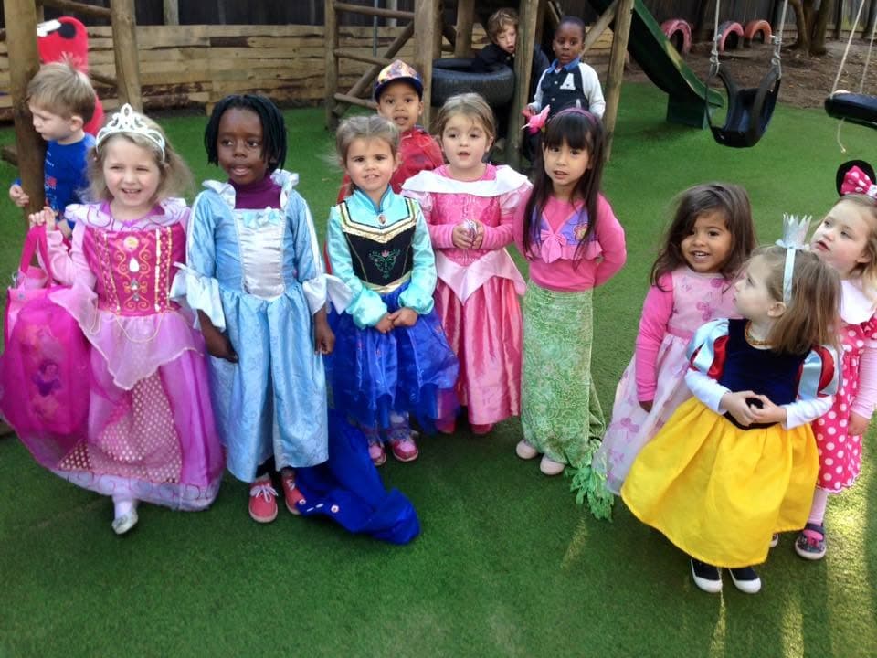 Children dressed up in colourful princess costumes for a dress-up day
